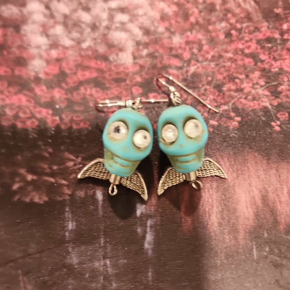 Skull Design Earrings with Silver Accents